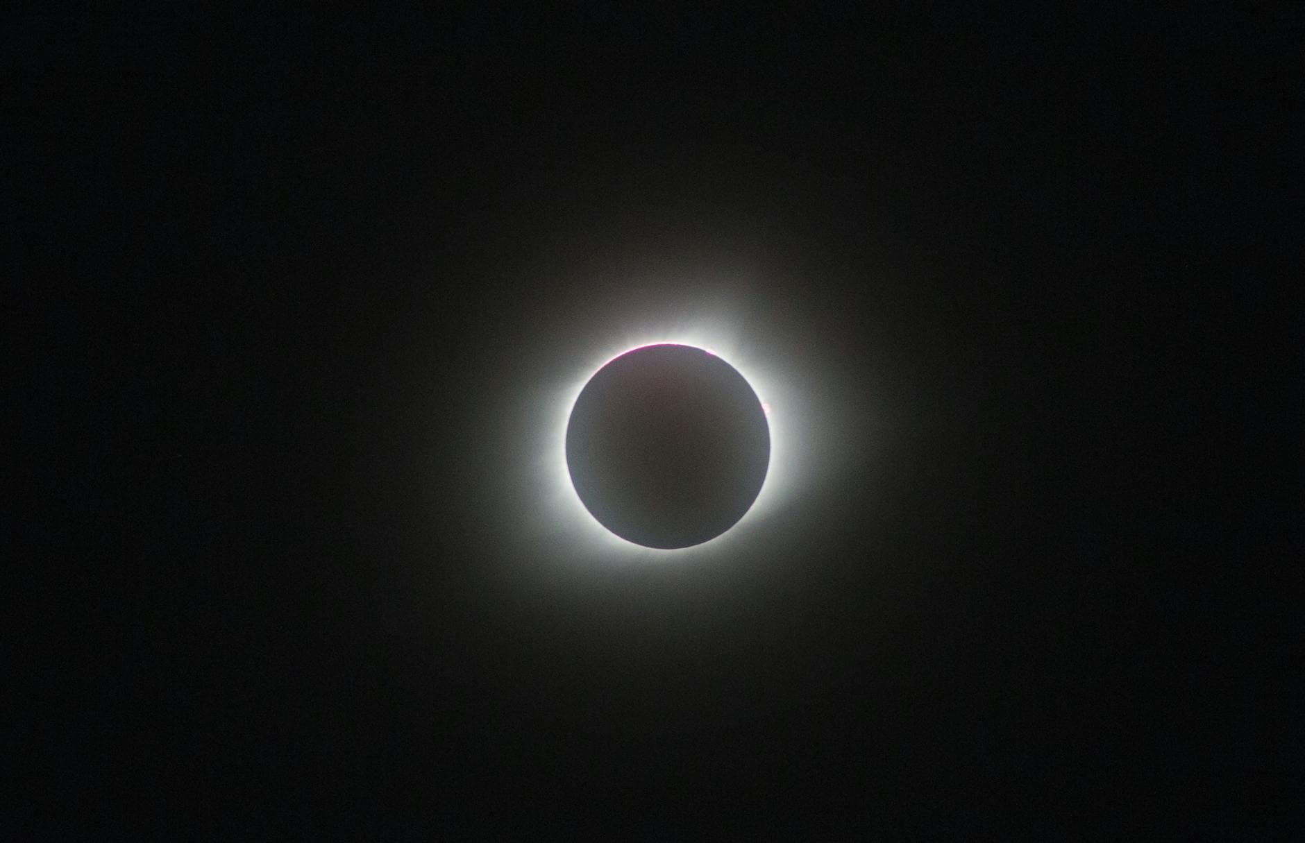 Stunning photograph of a total solar eclipse revealing the sun's corona.