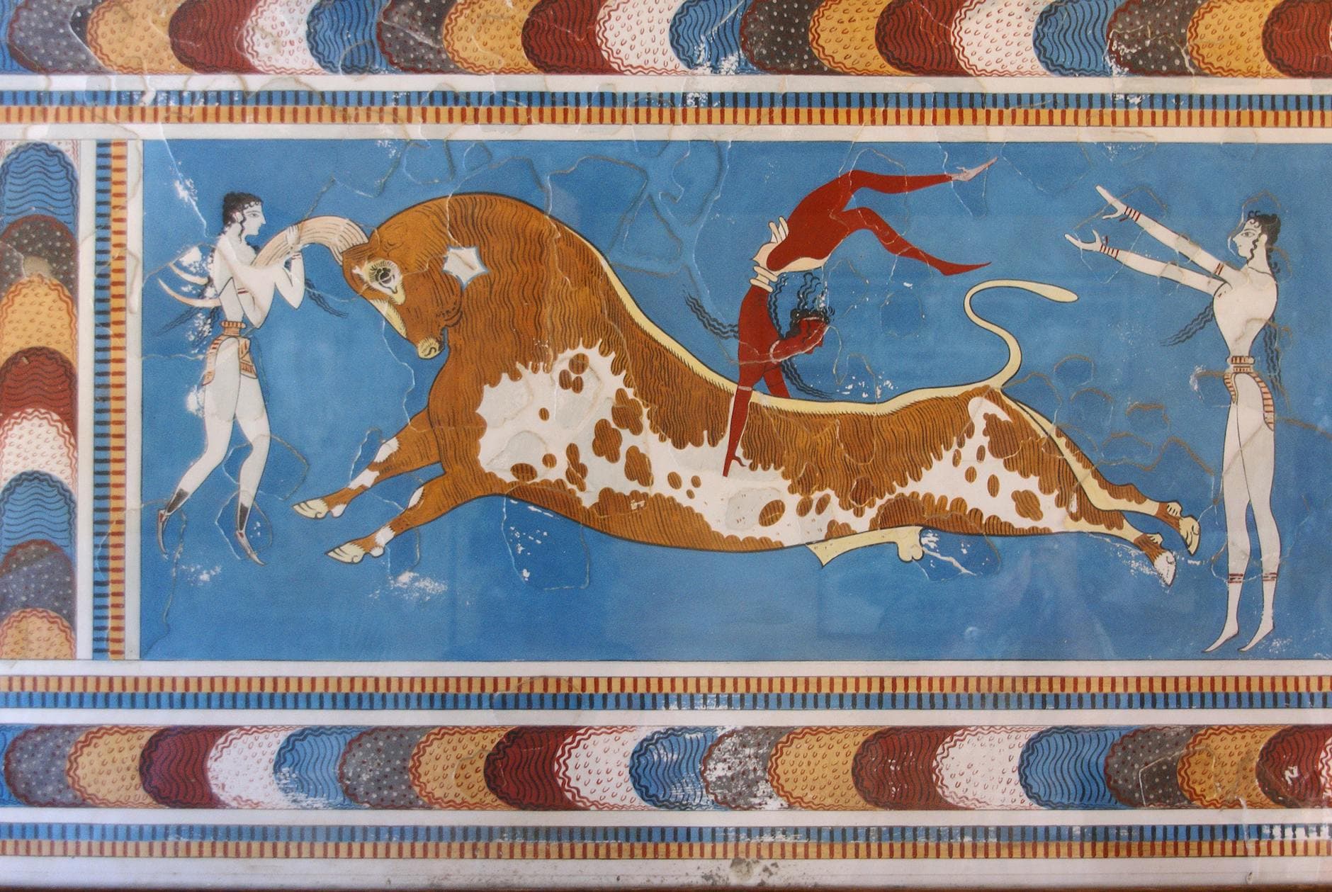 Colorful Minoan fresco depicting bull-leaping from Knossos, Crete, Greece.